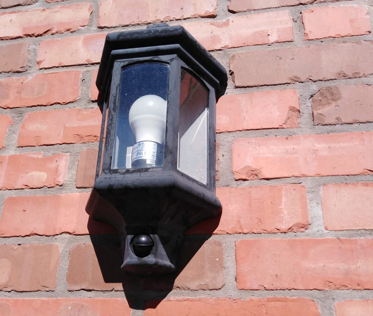 External light installation on a brick wall